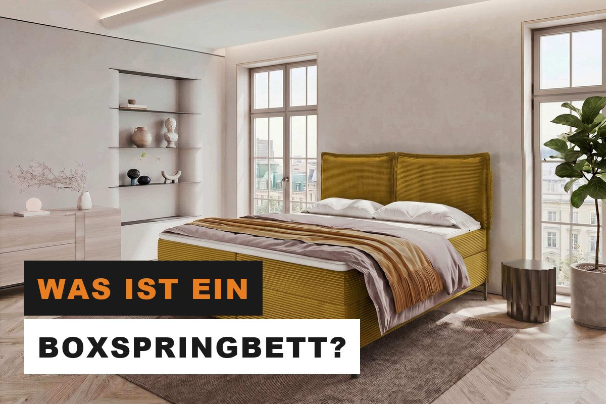 Boxspringbett in Cord mit hohem Kopfteil in einem hellen Schlafzimmer