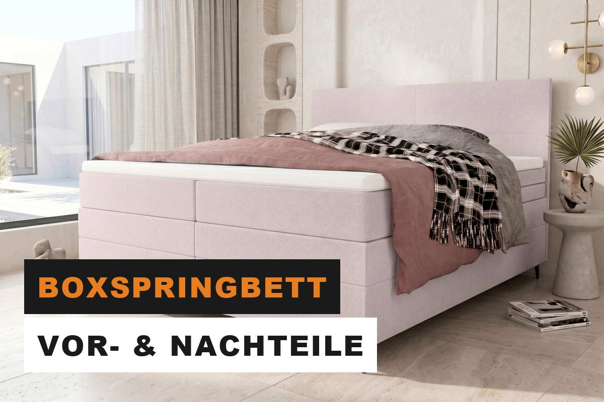 Boxspringbett mit gepolstertem Kopfteil und Topper in einem hellen Raum